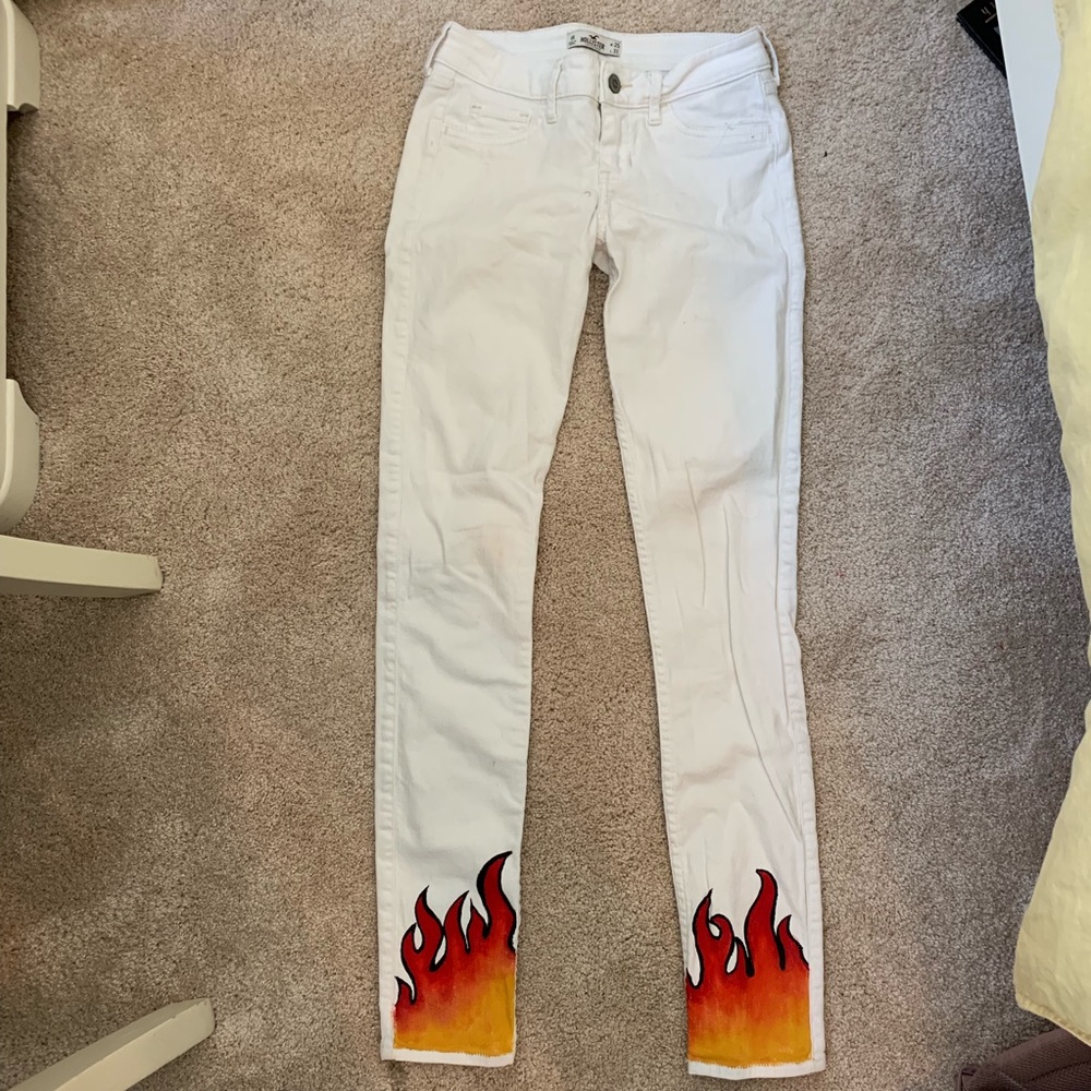 white flame painted skinny jeans
